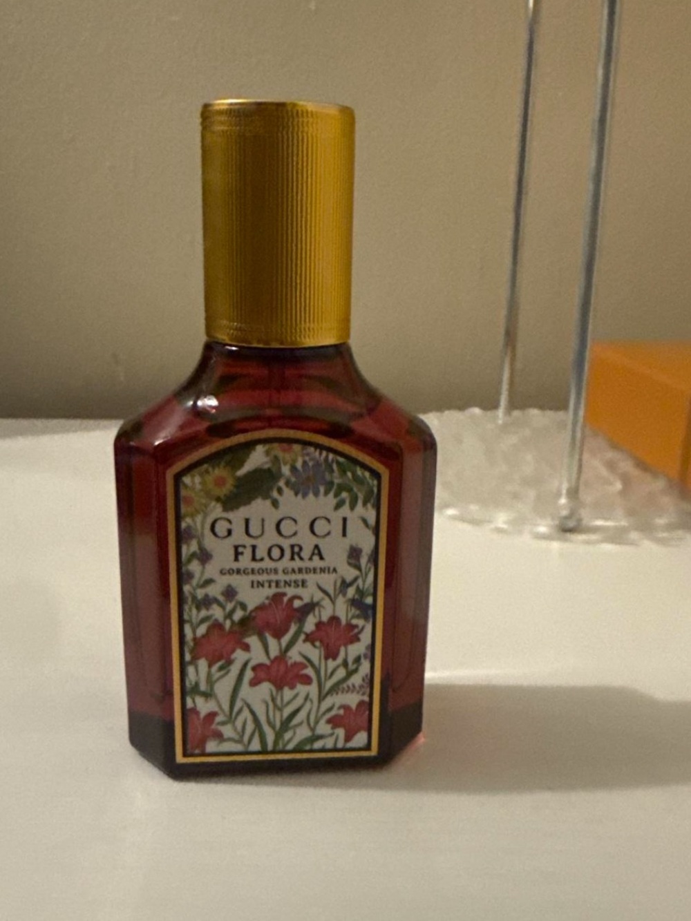 Gucci Flora Red Glass Perfume with Gold Cap
